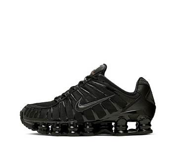 Nike Shox TL series low-top casual shoes, black and gold.